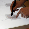Diagram Editing on Interactive Displays Using Multi-Touch and Pen Gestures