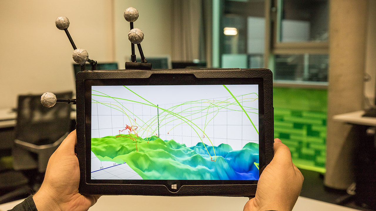 Accompanying video to our paper 'Investigating the Use of Spatial Interaction for 3D Data Visualization on Mobile Devices'. The thumbnail shows a tracked tablet displaying a mixed reality visualization of a 3D height map.